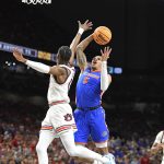 Florida guard Will Richard (5) goes up for a layup as the Florida Gators face the Auburn Tigers on Saturday, April 5, 2025, at the Alamodome in San Antonio, Texas. (Matthew Lewis/WRUF)