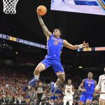 Florida guard Alijah Martin (15) flies through the air as the Florida Gators face the Auburn Tigers on Saturday, April 5, 2025, at the Alamodome in San Antonio, Texas. (Matthew Lewis/WRUF)