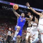 Florida guard Alijah Martin (15) rises up for a dunk as the Florida Gators face the Auburn Tigers on Saturday, April 5, 2025, at the Alamodome in San Antonio, Texas. (Matthew Lewis/WRUF)