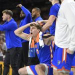 Florida center Micah Handlogten (3) celebrates a dunk as the Florida Gators face the Auburn Tigers on Saturday, April 5, 2025, at the Alamodome in San Antonio, Texas. (Matthew Lewis/WRUF)