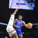Florida guard Alijah Martin (15) looks for a pass midair as the Florida Gators face the Auburn Tigers on Saturday, April 5, 2025, at the Alamodome in San Antonio, Texas. (Matthew Lewis/WRUF)
