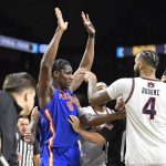 Florida center Rueben Chinyelu (9) gets into a heated argument with Auburn forward/center Johni Broome (4) as the Florida Gators face the Auburn Tigers on Saturday, April 5, 2025, at the Alamodome in San Antonio, Texas. (Matthew Lewis/WRUF)