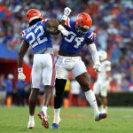 Kofi Asare (#22) and Tyreak Sapp (#94) celebrate on the field during the Gators’ game against the Mississippi State Bulldogs at Ben Hill Griffin Stadium in Gainesville, Fla., Saturday night, Oct. 18, 2025. (Libby Clifton/WRUF)