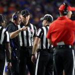 Former Florida head coach Billy Napier speaks with officials on the sideline during the Gators’ game against Mississippi State at Ben Hill Griffin Stadium. (Libby Clifton/WRUF)