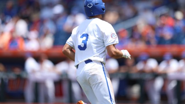 Kyle Jones rounds third after a solo-shot homer to lead off the bottom of the first inning. (Photo by Ryan Scarane/WRUF)