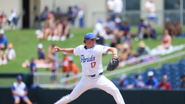 Russell Sandefer delivers the first pitch of the top of the second inning. (Photo by Ryan Scarane/WRUF)