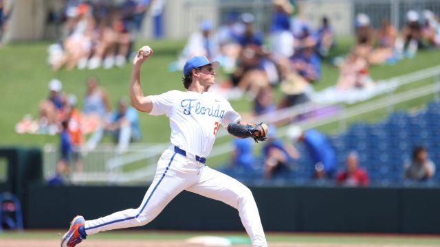 Caden McDonald warms up on the mound as he replaces Russell Sandefer in the sixth inning. (Photo by Ryan Scarane/WRUF)