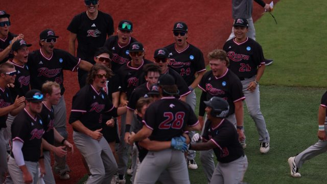 Rider is ecstatic after they took the lead in the top of the eighth, a shocking moment for the Broncs. (Photo by Ryan Scarane/WRUF)