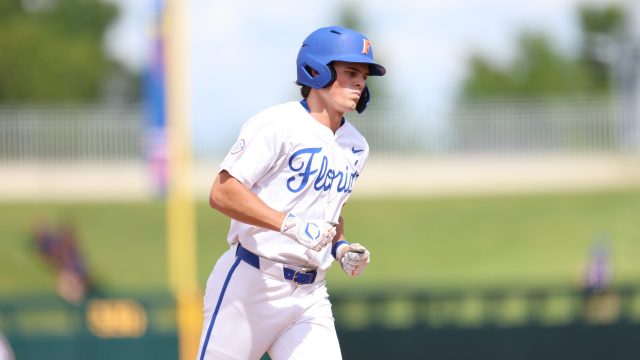 Caden McDonald rounds third base straight-faced after his solo homer brings the Gators only one run shy of Rider in the eighth inning. (Photo by Ryan Scarane/WRUF)