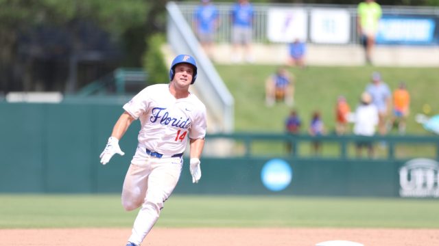 Caden McDonald rounds third base straight-faced after his solo homer brings the Gators only one run shy of Rider in the eighth inning. (Photo by Ryan Scarane/WRUF)