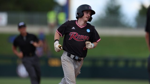 Matt Leahy rounds third base in the ninth inning after his solo home run ties the game at 7-7. (Photo by Ryan Scarane/WRUF)