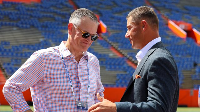 Florida Head Coach Jon Sumrall (right) speaks to UF athletic director Scott Stricklin (left) at Ben Hill Griffin stadium before an NCAA college football game against Campbell College,Saturday, Sept. 12,2026, in Gainesville, Fla. (Reagan Bresnahan/ WRUF)