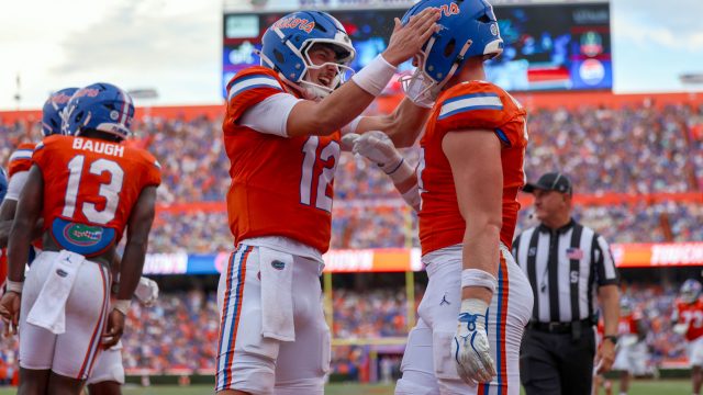 Florida quarterback Aaron Philo (12) celebrates with his teammate, tight end Lacota Dippre (17) during the first half of an NCAA college football game against Campbell University, Saturday, Sept. 12, 2026, in Gainesville, Fla. (Reagan Bresnahan/WRUF)