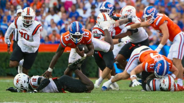 Florida running back Jadan Baugh (13) dives with the ball during the first half of an NCAA college football game
against Campbell University, Saturday, Sept. 12, 2026, in Gainesville, Fla. (Reagan Bresnahan/WRUF)